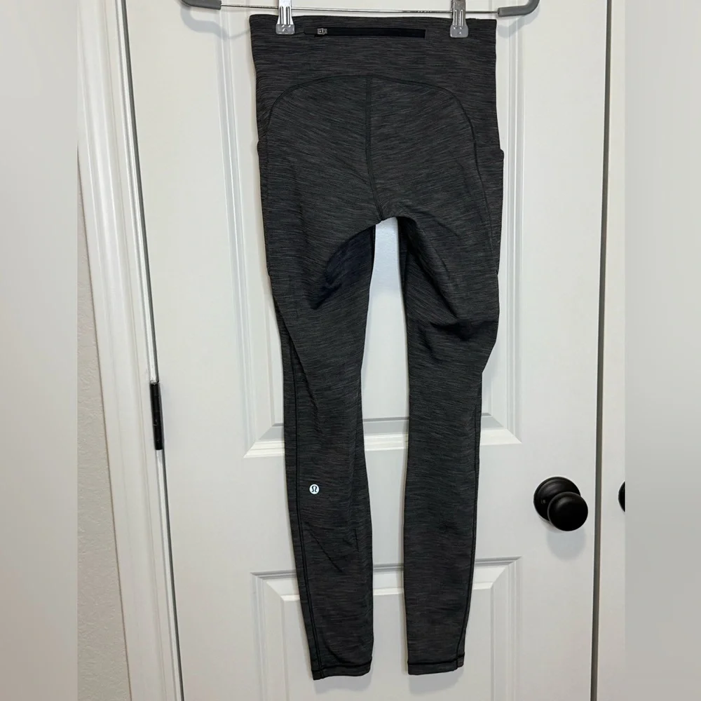 Lululemon Speed Up Tight in Heathered Black - Size 4